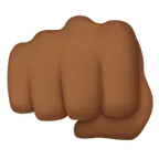 oncoming fist: medium-dark skin tone untuk platform Apple