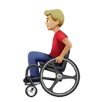 man in manual wheelchair: medium-light skin tone für Apple Plattform