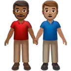 men holding hands: medium-dark skin tone, medium skin tone per la piattaforma Apple