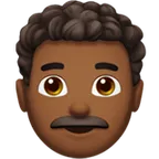 man: medium-dark skin tone, curly hair สำหรับแพลตฟอร์ม Apple