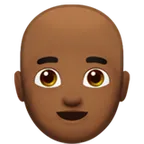 man: medium-dark skin tone, bald alustalla Apple