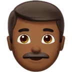 man: medium-dark skin tone untuk platform Apple