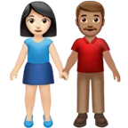 woman and man holding hands: light skin tone, medium skin tone für Apple Plattform