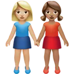 women holding hands: medium-light skin tone, medium skin tone for Apple platform