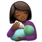 woman feeding baby: medium-dark skin tone til Apple platform