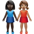 women holding hands: dark skin tone, medium skin tone for Apple platform