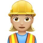 woman construction worker: medium-light skin tone สำหรับแพลตฟอร์ม Apple