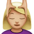 woman getting massage: medium-light skin tone til Apple platform