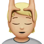 person getting massage: medium-light skin tone สำหรับแพลตฟอร์ม Apple