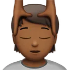 person getting massage: medium-dark skin tone สำหรับแพลตฟอร์ม Apple