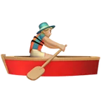 man rowing boat: medium-light skin tone for Apple platform