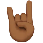 sign of the horns: medium-dark skin tone สำหรับแพลตฟอร์ม Apple