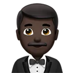 man in tuxedo: dark skin tone per la piattaforma Apple