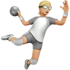 person playing handball: medium-light skin tone per la piattaforma Apple
