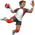 man playing handball: medium skin tone pentru platforma Apple