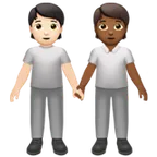 people holding hands: light skin tone, medium-dark skin tone for Apple platform