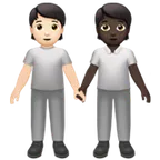 people holding hands: light skin tone, dark skin tone for Apple platform