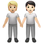 people holding hands: medium-light skin tone, light skin tone для платформи Apple