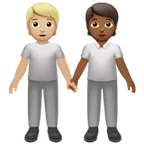 people holding hands: medium-light skin tone, medium-dark skin tone pentru platforma Apple