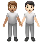 people holding hands: medium skin tone, light skin tone pentru platforma Apple