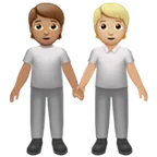 people holding hands: medium skin tone, medium-light skin tone per la piattaforma Apple