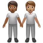 people holding hands: medium-dark skin tone, medium skin tone per la piattaforma Apple