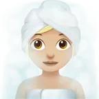 woman in steamy room: medium-light skin tone for Apple platform