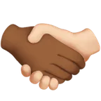 handshake: medium-dark skin tone, light skin tone for Apple platform