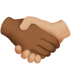 handshake: medium-dark skin tone, medium-light skin tone per la piattaforma Apple