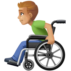 man in manual wheelchair: medium-light skin tone für Facebook Plattform