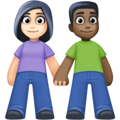 woman and man holding hands: light skin tone, dark skin tone para a plataforma Facebook