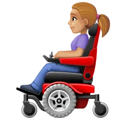 woman in motorized wheelchair: medium-light skin tone สำหรับแพลตฟอร์ม Facebook