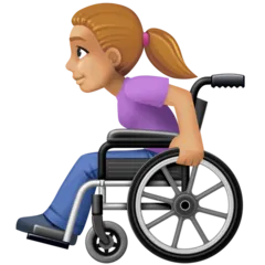 woman in manual wheelchair: medium-light skin tone สำหรับแพลตฟอร์ม Facebook