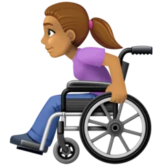 woman in manual wheelchair: medium skin tone สำหรับแพลตฟอร์ม Facebook
