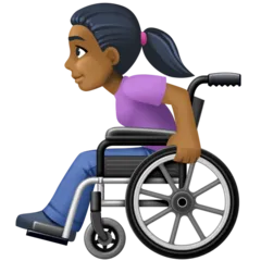woman in manual wheelchair: medium-dark skin tone til Facebook platform