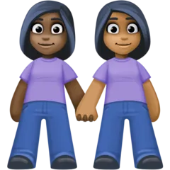 women holding hands: dark skin tone, medium-dark skin tone für Facebook Plattform