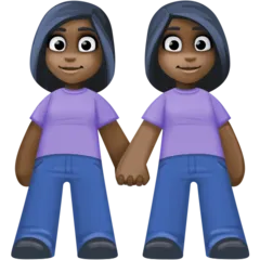 women holding hands: dark skin tone für Facebook Plattform