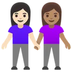 women holding hands: light skin tone, medium skin tone til Google platform