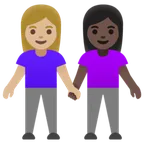 women holding hands: medium-light skin tone, dark skin tone für Google Plattform