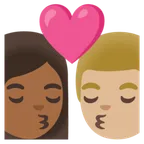 kiss: woman, man, medium-dark skin tone, medium-light skin tone for Google platform