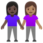 women holding hands: dark skin tone, medium skin tone for Google platform