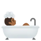 person taking bath: medium-dark skin tone per la piattaforma Google
