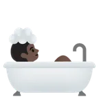 person taking bath: dark skin tone per la piattaforma Google