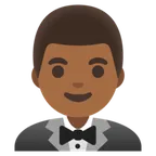 man in tuxedo: medium-dark skin tone สำหรับแพลตฟอร์ม Google