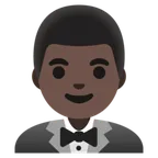 man in tuxedo: dark skin tone per la piattaforma Google