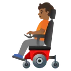 person in motorized wheelchair: medium-dark skin tone สำหรับแพลตฟอร์ม Google