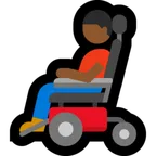 man in motorized wheelchair: medium-dark skin tone สำหรับแพลตฟอร์ม Microsoft