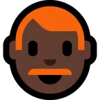 Microsoft platformu için man: dark skin tone, red hair