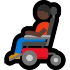 man in motorized wheelchair: dark skin tone สำหรับแพลตฟอร์ม Microsoft