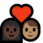 couple with heart: woman, man, dark skin tone, medium skin tone per la piattaforma Microsoft